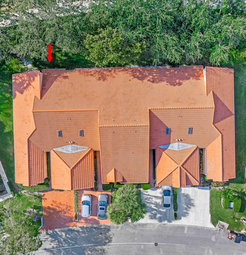 9976 Seacrest Circle, Unit A Boynton Beach, FL 33437 - Photo 32 of 48 an aerial view of a house with an outdoor space