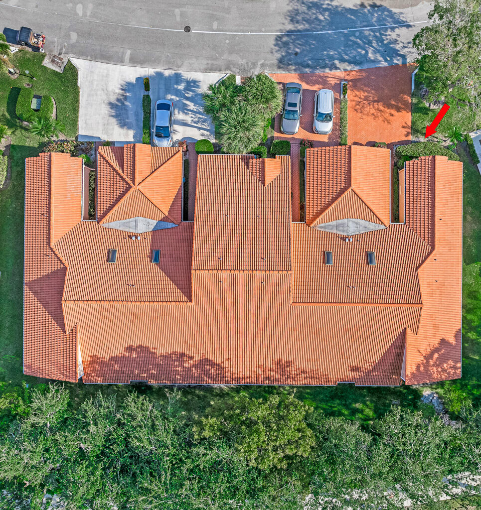 9976 Seacrest Circle, Unit A Boynton Beach, FL 33437 - Photo 33 of 48 an aerial view of residential house with outdoor space and swimming pool