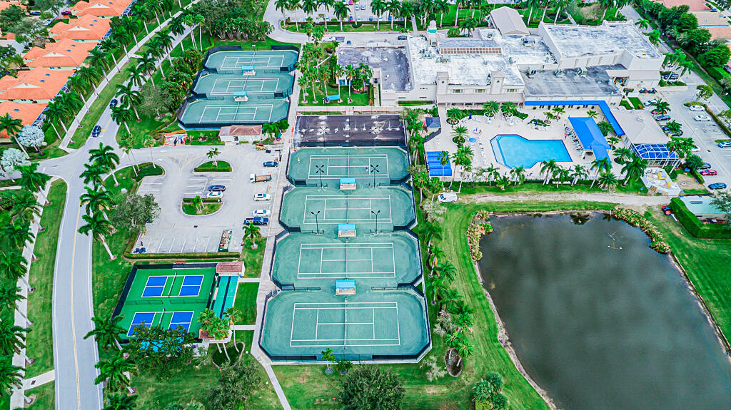 9976 Seacrest Circle, Unit A Boynton Beach, FL 33437 - Photo 41 of 48 an aerial view of residential house with outdoor space and parking