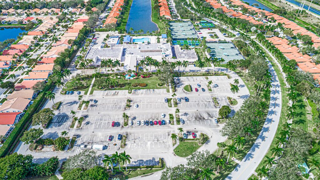 9976 Seacrest Circle, Unit A Boynton Beach, FL 33437 - Photo 45 of 48 an aerial view of residential houses with outdoor space