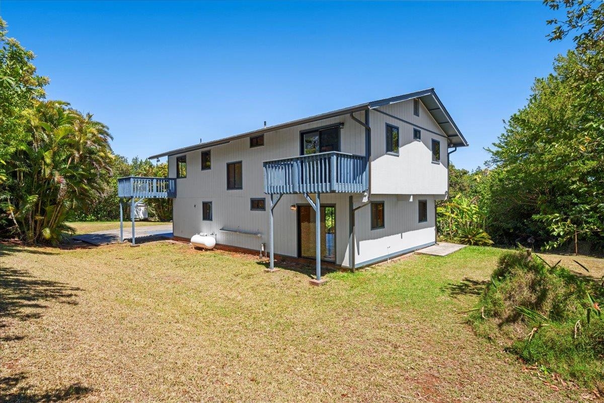 2130 Kauhikoa Road, Unit A Haiku, HI 96708 - Photo 33 of 43 a view of a house with backyard and sitting area