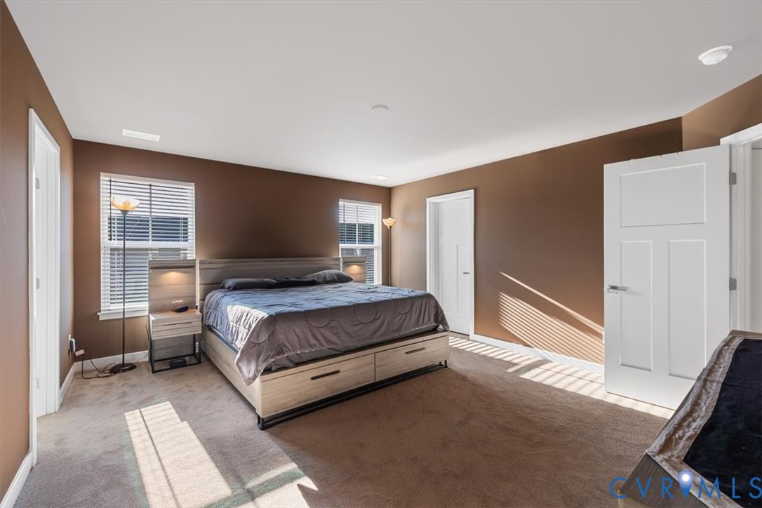 9002 Spring Green Loop Mechanicsville, VA 23116 - Photo 11 of 47 Carpeted bedroom featuring baseboards