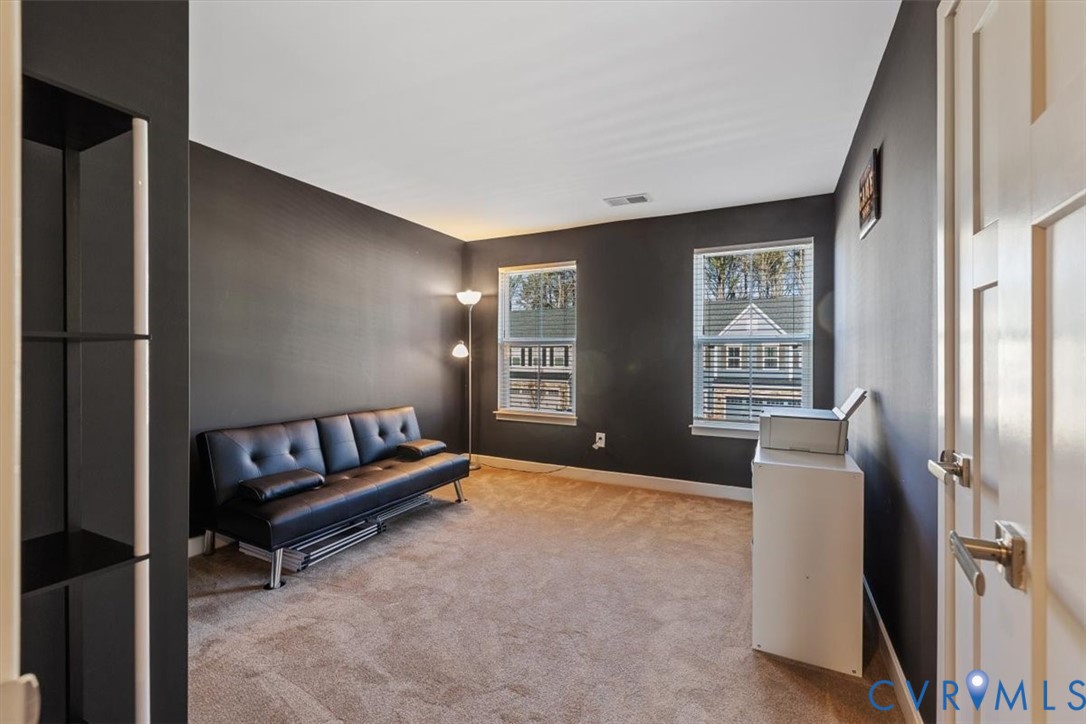 9002 Spring Green Loop Mechanicsville, VA 23116 - Photo 14 of 47 Sitting room with light colored carpet and baseboa