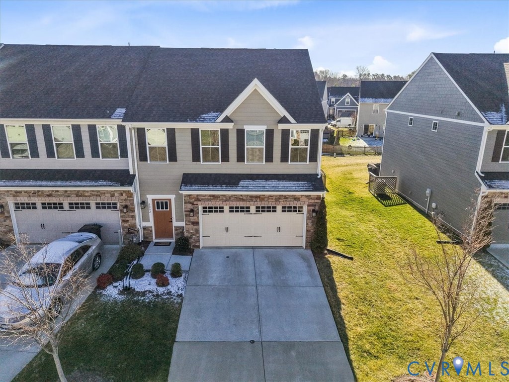 9002 Spring Green Loop Mechanicsville, VA 23116 - Photo 2 of 47 View of front facade with stone siding, concrete d