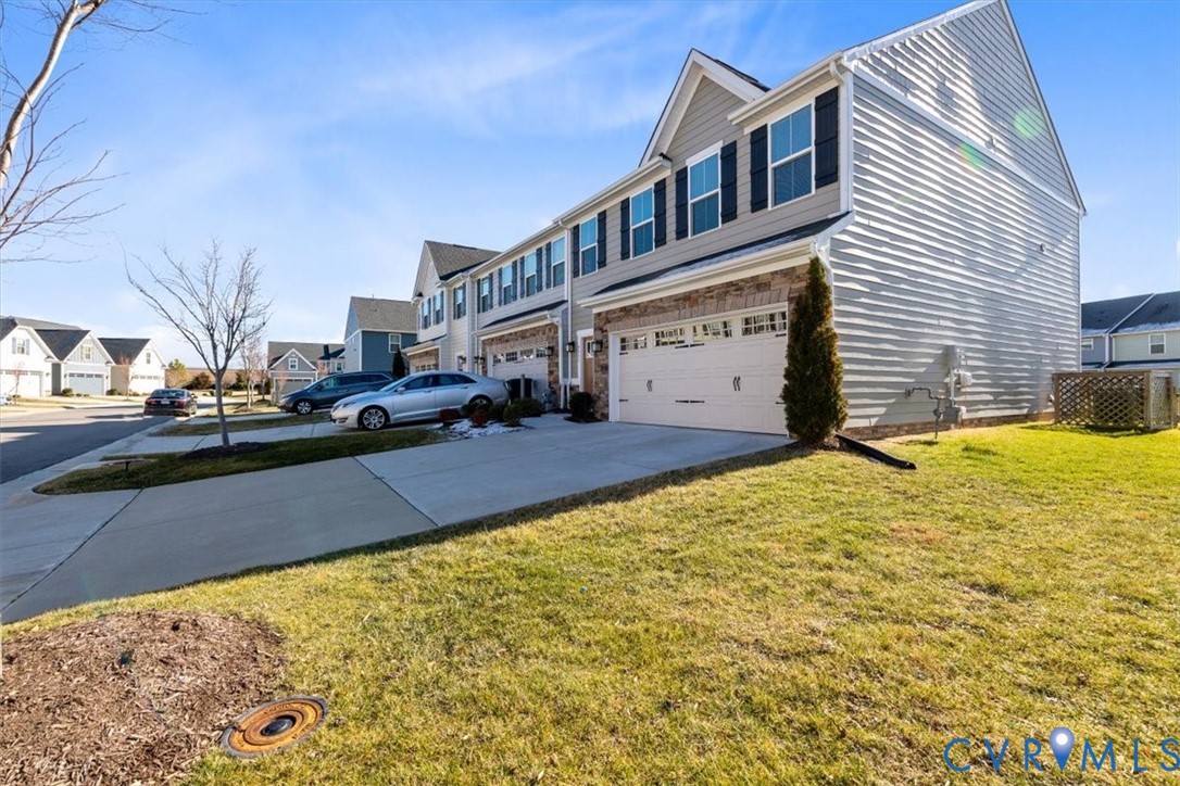 9002 Spring Green Loop Mechanicsville, VA 23116 - Photo 22 of 47 View of side of property featuring a residential v