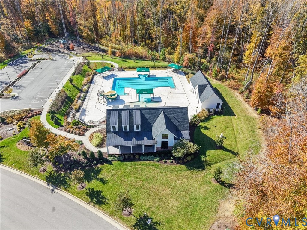 9002 Spring Green Loop Mechanicsville, VA 23116 - Photo 35 of 47 Aerial view of a pool and a forest