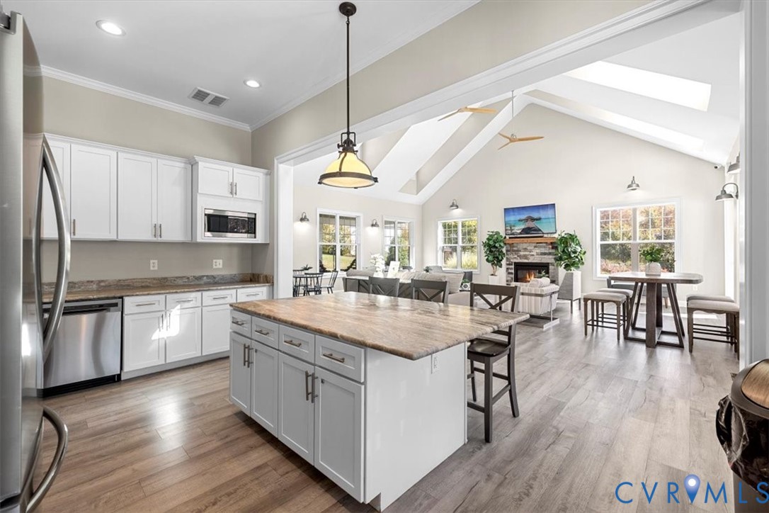 9002 Spring Green Loop Mechanicsville, VA 23116 - Photo 40 of 47 Kitchen with a breakfast bar area, appliances with