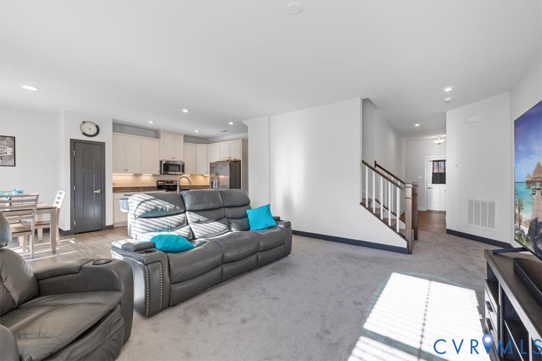 9002 Spring Green Loop Mechanicsville, VA 23116 - Photo 6 of 47 Living room featuring stairs, recessed lighting, a
