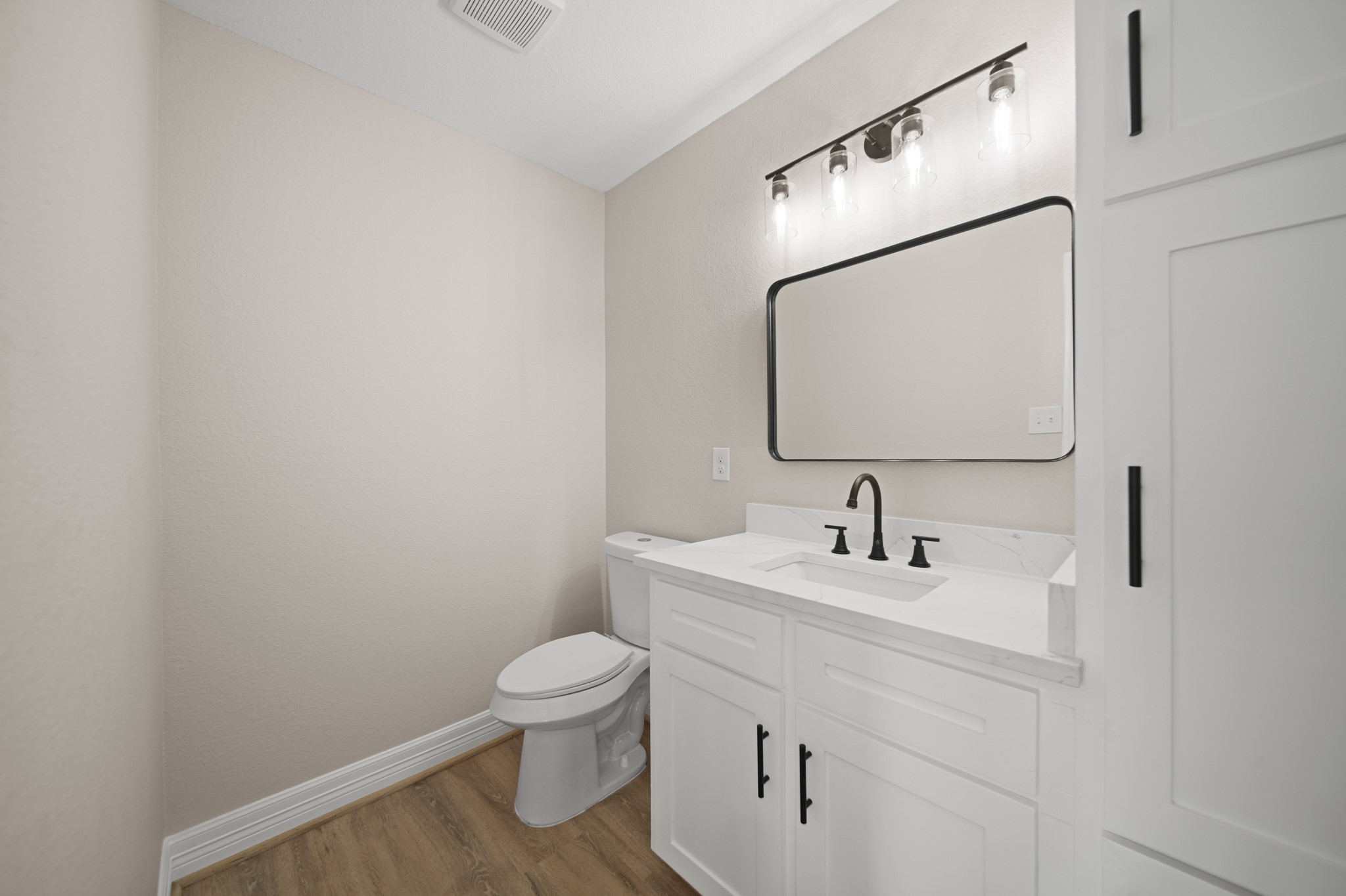 220 Pine Road Clear Lake Shores, TX 77565 - Photo 13 of 31 a bathroom with a toilet sink and mirror