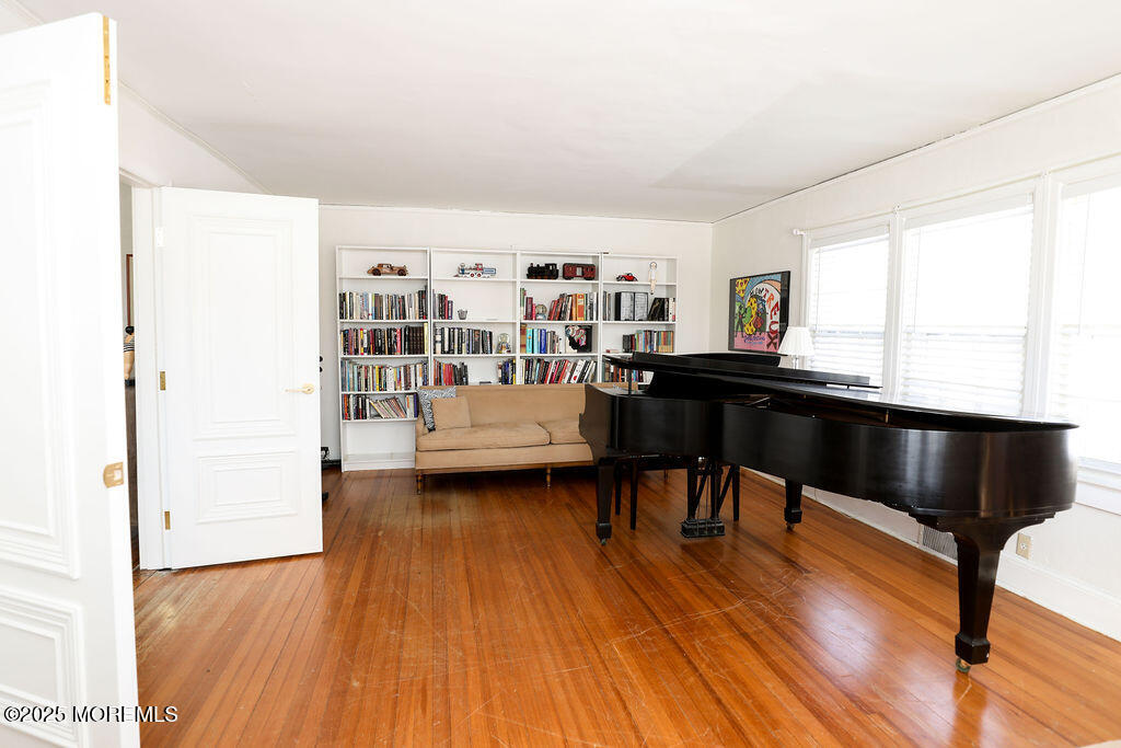 17 Beach Road Monmouth Beach, NJ 07750 - Photo 18 of 44 a living room with furniture and a wooden floor