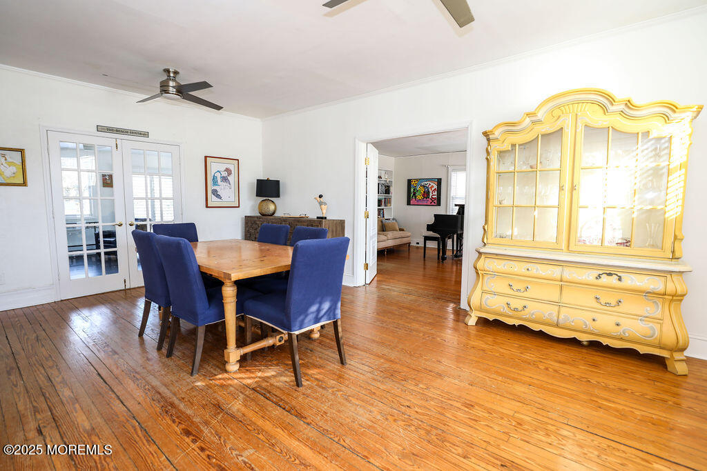 17 Beach Road Monmouth Beach, NJ 07750 - Photo 9 of 44 a view of a dining room with furniture window and wooden floor