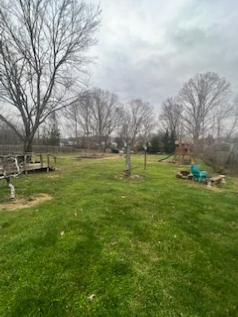 3016 Lyndhurst Road Stuarts Draft, VA 24477 - Photo 13 of 15 a big yard with lots of green space and trees