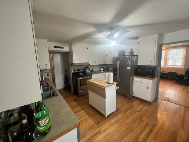 3016 Lyndhurst Road Stuarts Draft, VA 24477 - Photo 3 of 15 a kitchen with a sink and a stove top oven