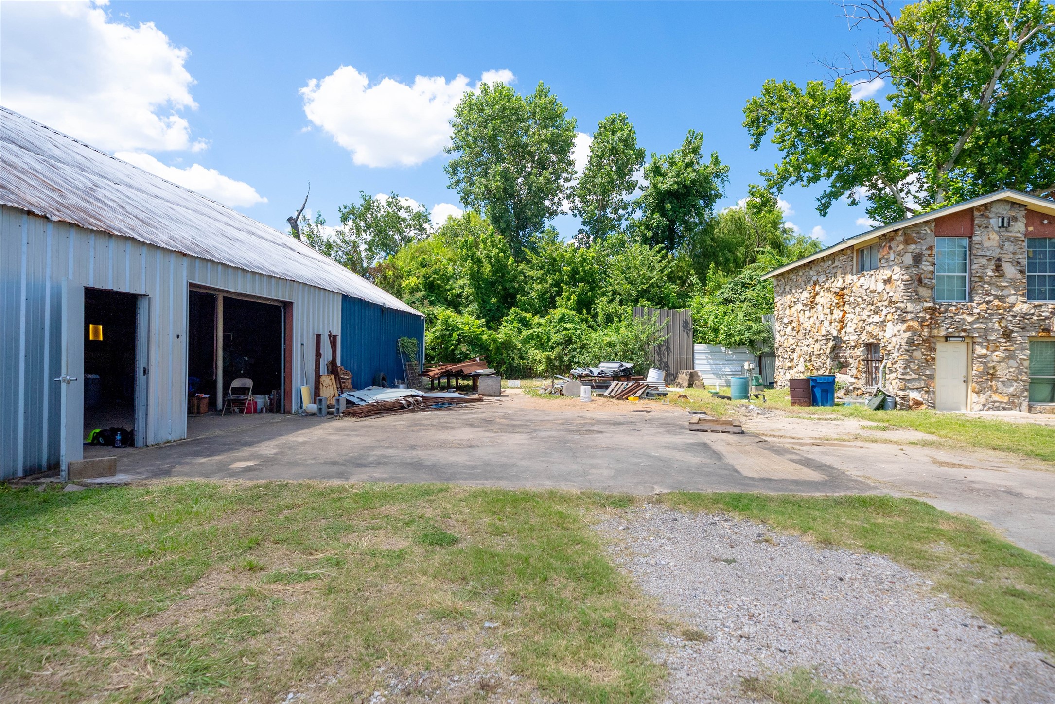 1939 Hopper Road Houston, TX 77093 - Photo 4 of 18 a view of street with house and trees in the background