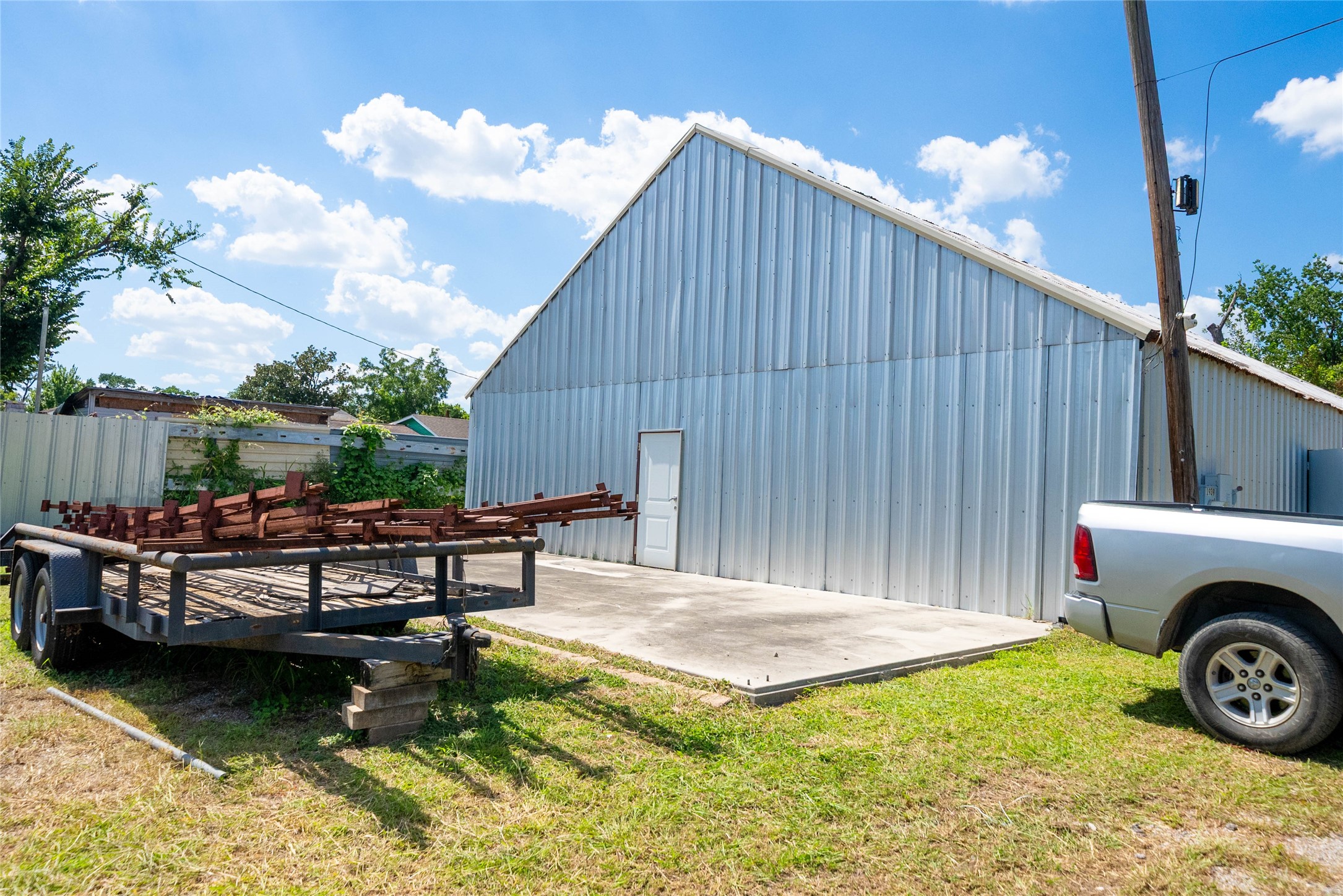 1939 Hopper Road Houston, TX 77093 - Photo 8 of 18 a view of a house with backyard and sitting area