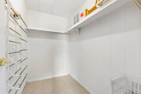 a view of a room with racks on the wall