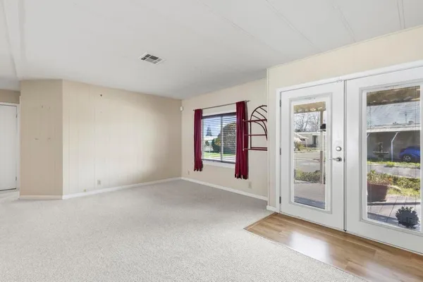 an empty room with windows