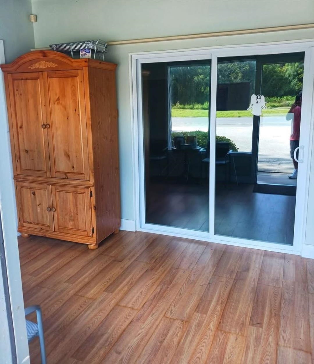 4935 State Road 207 Elkton, FL 32033 - Photo 3 of 6 an empty room with wooden floor and windows