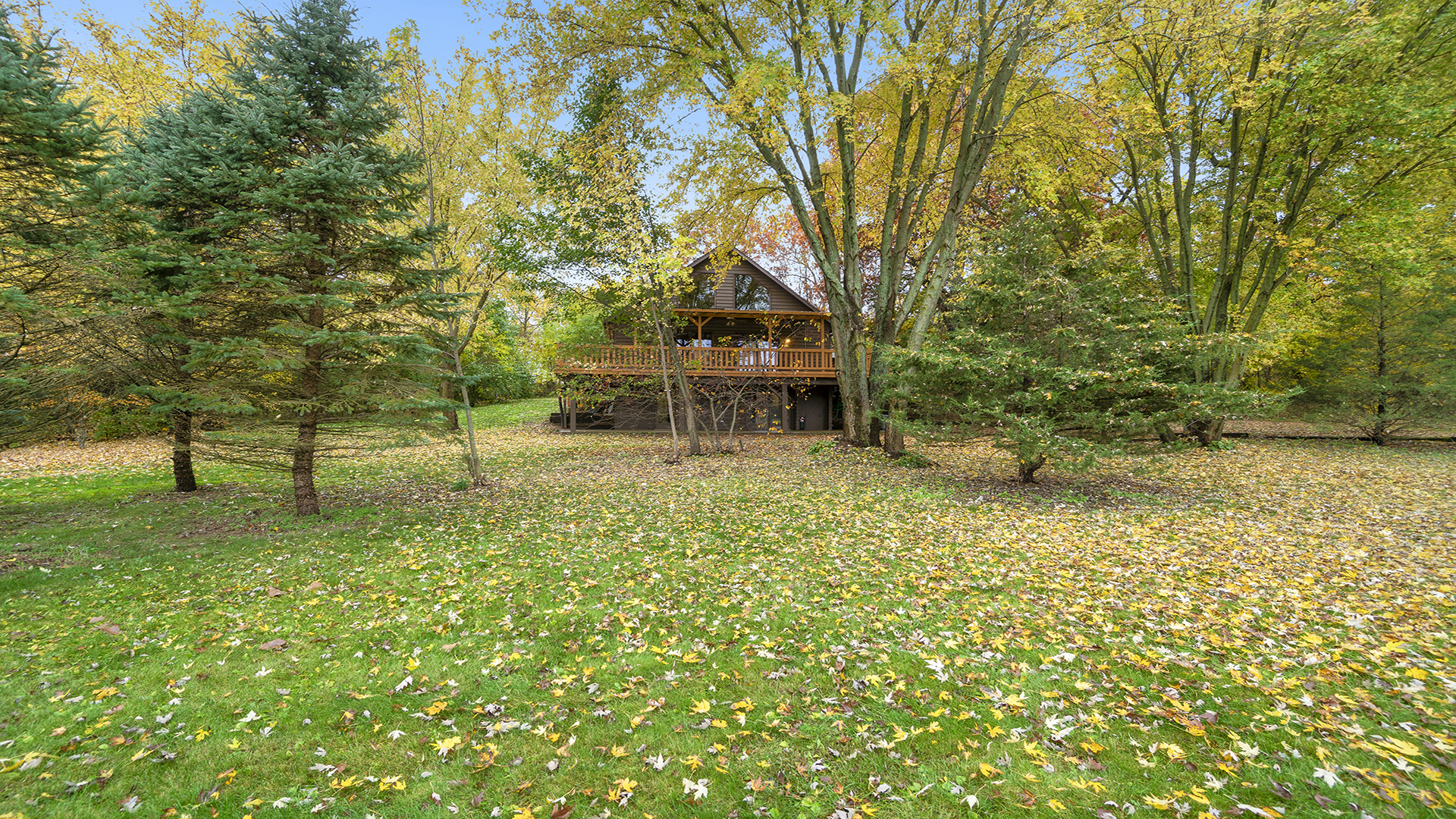 1360 Sleepy Hollow Road Amboy, IL 61310 - Photo 5 of 43 a backyard of a house with table and chairs