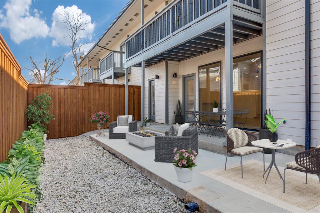5755 Phoenix Drive, Unit A Dallas, TX 75231 - Photo 21 of 28 a living room with patio furniture and potted plants
