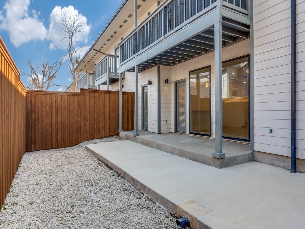 5755 Phoenix Drive, Unit A Dallas, TX 75231 - Photo 22 of 28 a view of backyard with garage