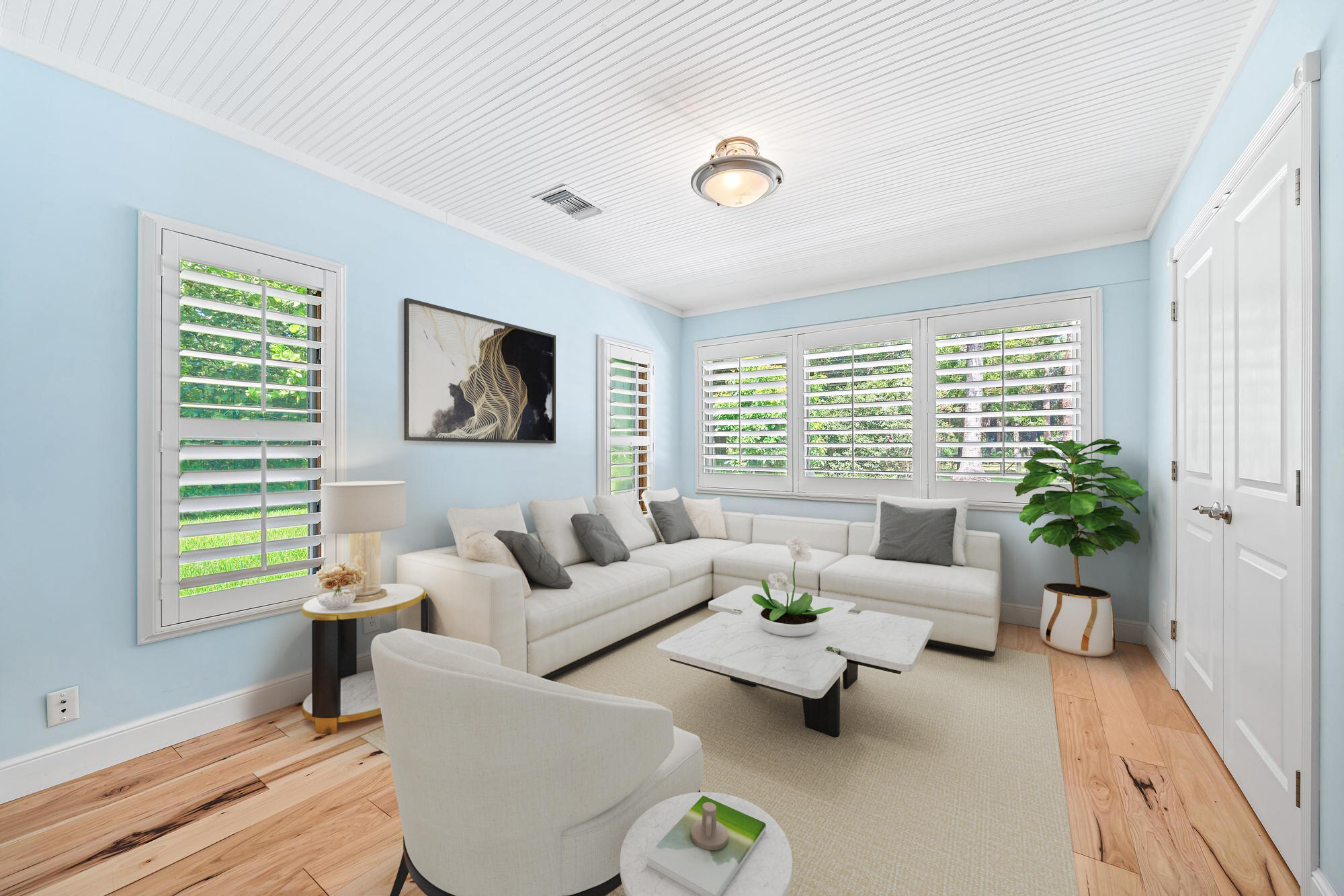 19150 Southeast Jupiter Road Jupiter, FL 33458 - Photo 18 of 43 a living room with furniture and a large window