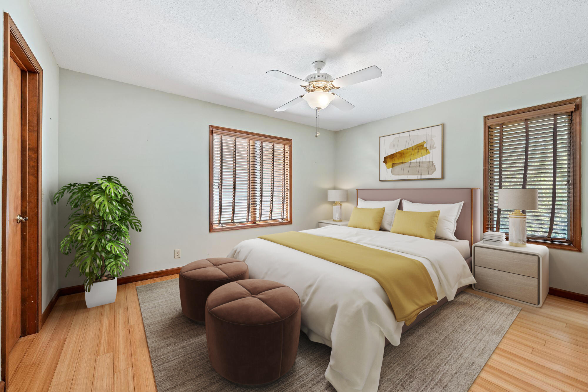 19150 Southeast Jupiter Road Jupiter, FL 33458 - Photo 22 of 43 a spacious bedroom with a bed and a window