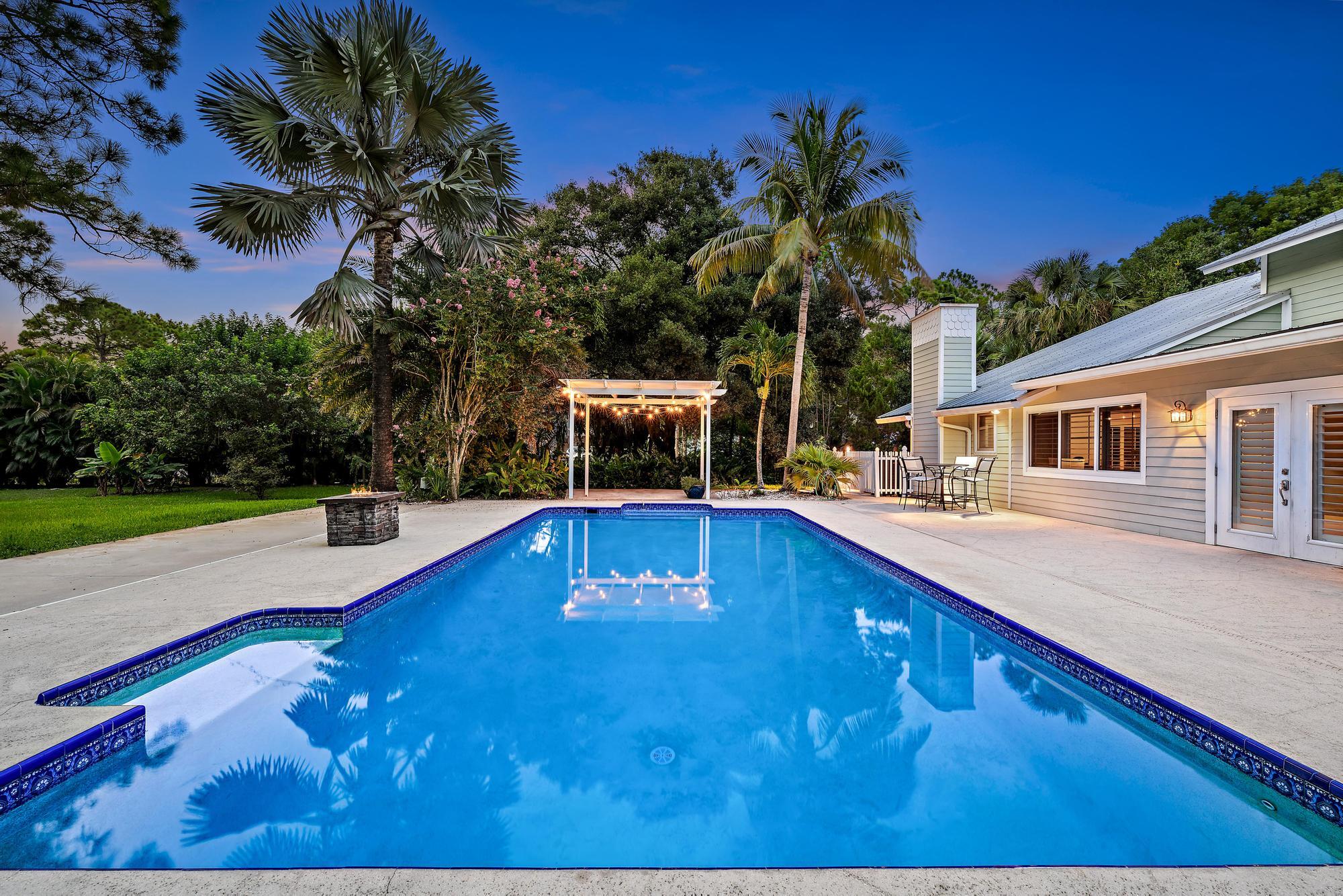19150 Southeast Jupiter Road Jupiter, FL 33458 - Photo 29 of 43 a view of a house with pool