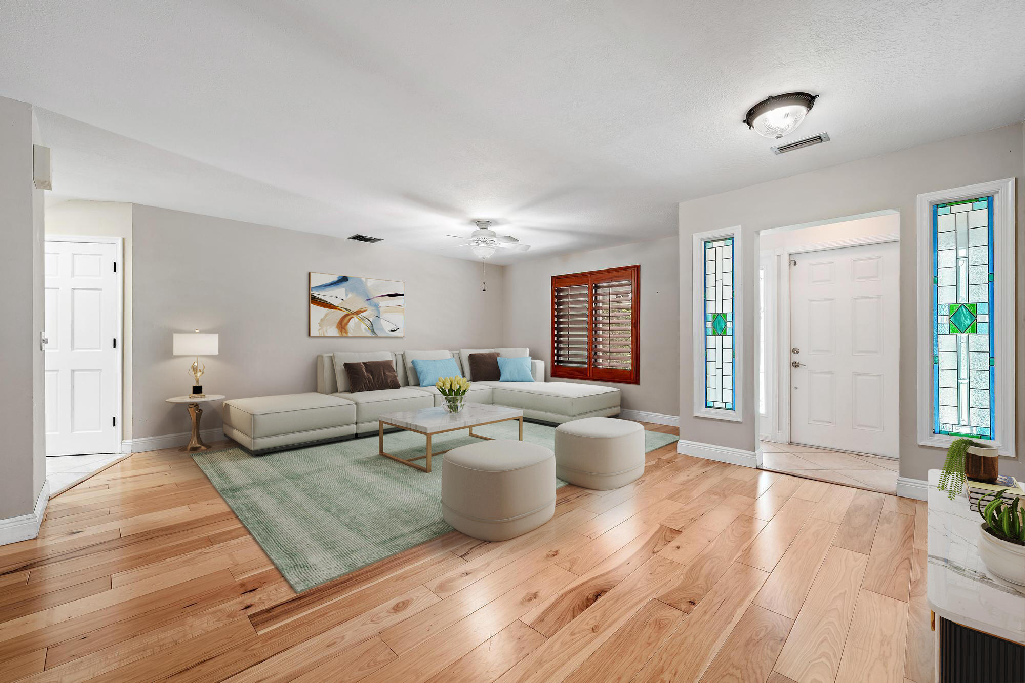 19150 Southeast Jupiter Road Jupiter, FL 33458 - Photo 6 of 43 a living room with furniture and a wooden floor
