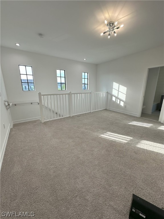 7464 Rockefeller Drive Naples, FL 34119 - Photo 10 of 22 a view of an empty room with a window