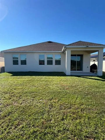 a view of a backyard with a garden
