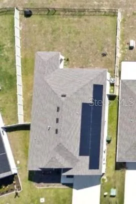 a view of swimming pool with seating area