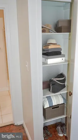 a storage room with washer and dryer