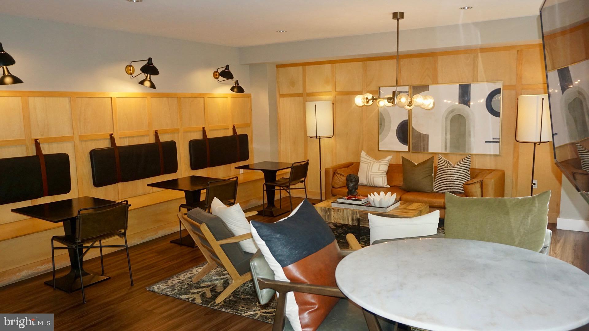 2030 F Street Northwest, Unit 508 Washington, DC 20006 - Photo 3 of 12 a balcony with table and chairs