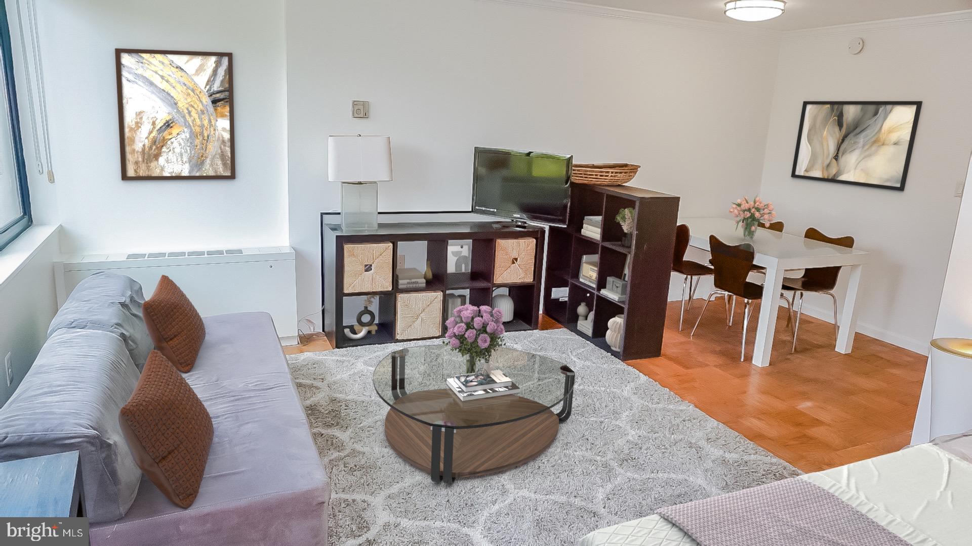 2030 F Street Northwest, Unit 508 Washington, DC 20006 - Photo 5 of 12 a living room with furniture and wooden floor