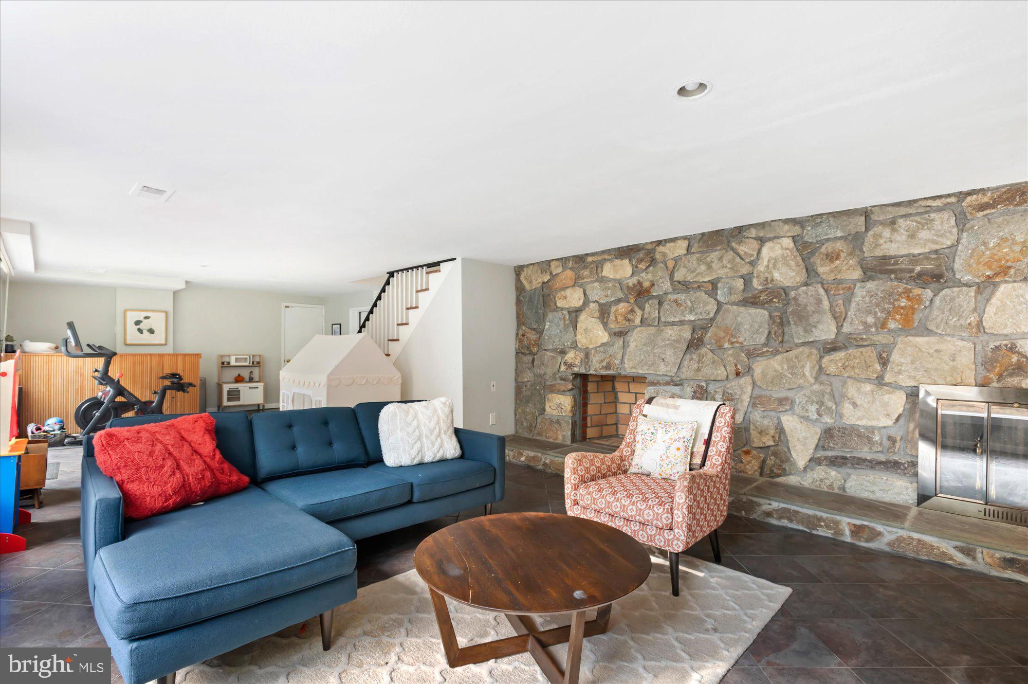 6812 Tulip Hill Terrace Bethesda, MD 20816 - Photo 21 of 35 a living room with furniture and a wooden floor