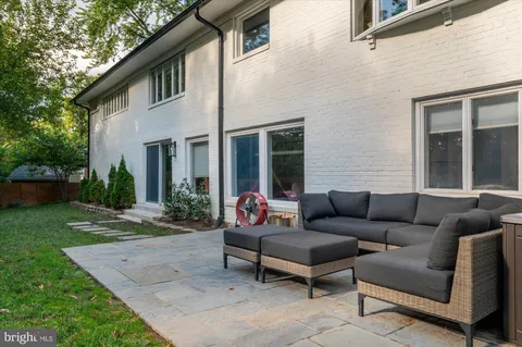 a building outdoor space with patio furniture