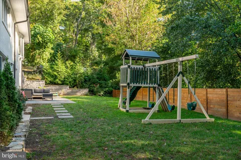 a view of a park with a slide
