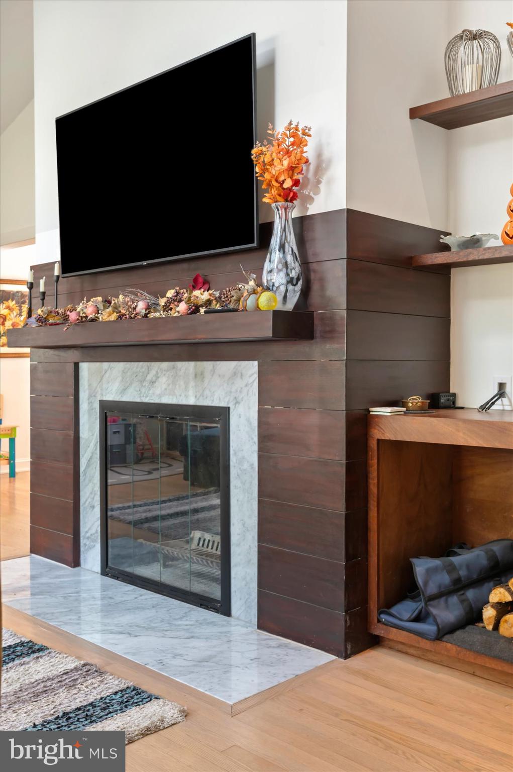 6812 Tulip Hill Terrace Bethesda, MD 20816 - Photo 4 of 35 a living room with furniture and a flat screen tv
