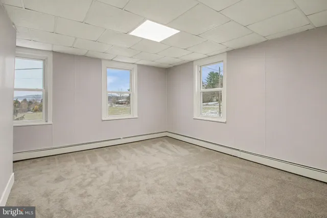 an empty room with windows