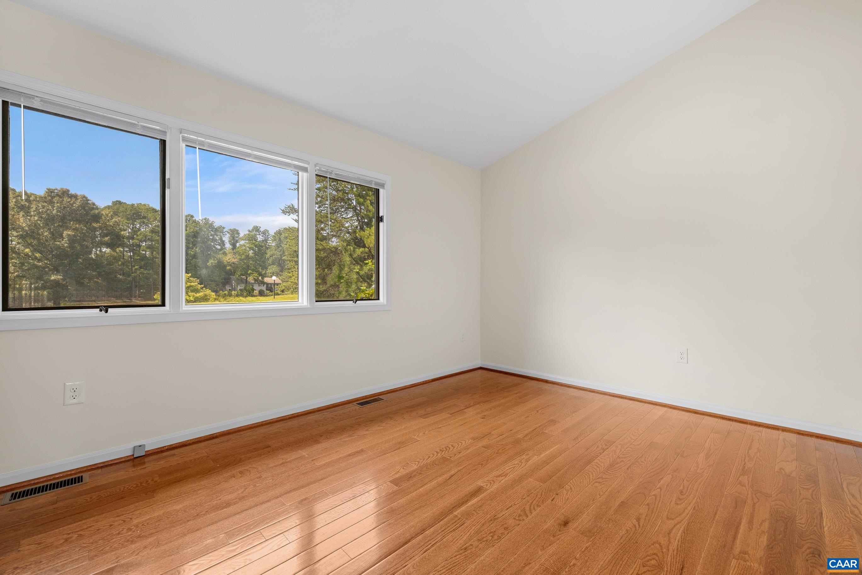 B2 Marina Point Palmyra, VA 22963 - Photo 13 of 37 a view of an empty room with wooden floor and a window