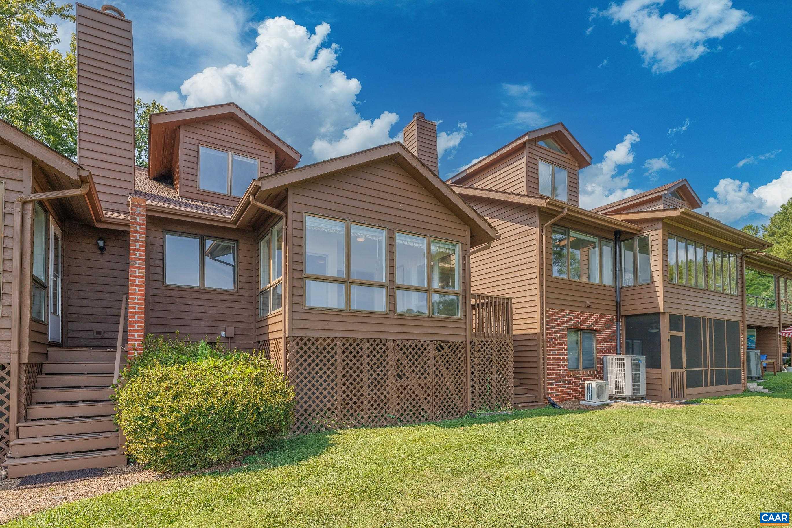 B2 Marina Point Palmyra, VA 22963 - Photo 33 of 37 a front view of a house with a garden