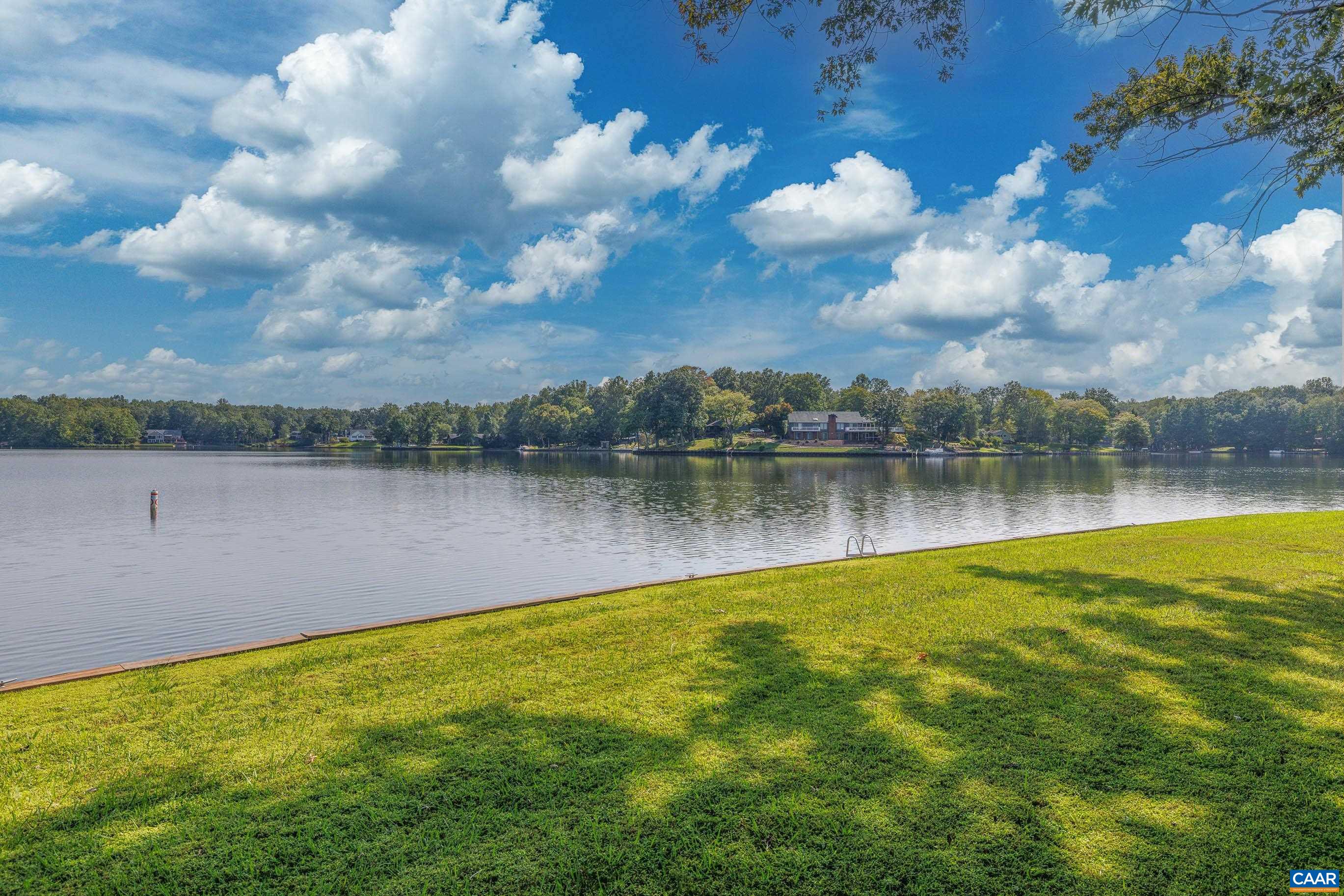 B2 Marina Point Palmyra, VA 22963 - Photo 34 of 37 a view of a lake with houses in the back