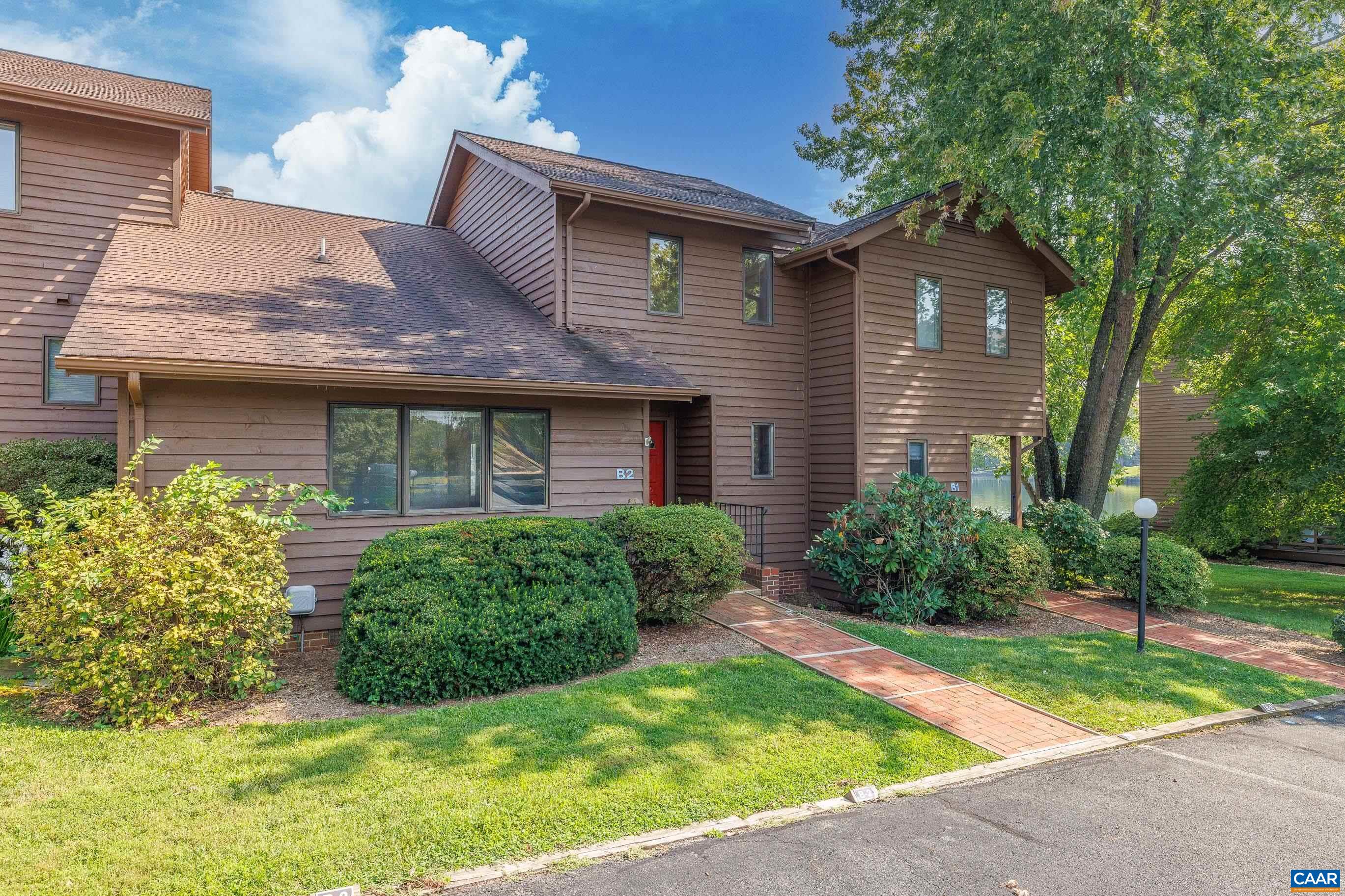 B2 Marina Point Palmyra, VA 22963 - Photo 35 of 37 a front view of a house with garden