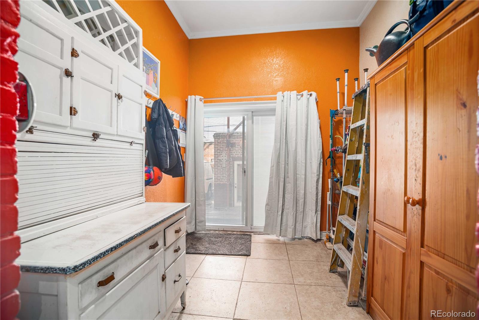 2623 Stout Street Denver, CO 80205 - Photo 11 of 39 a view of storage and utility room