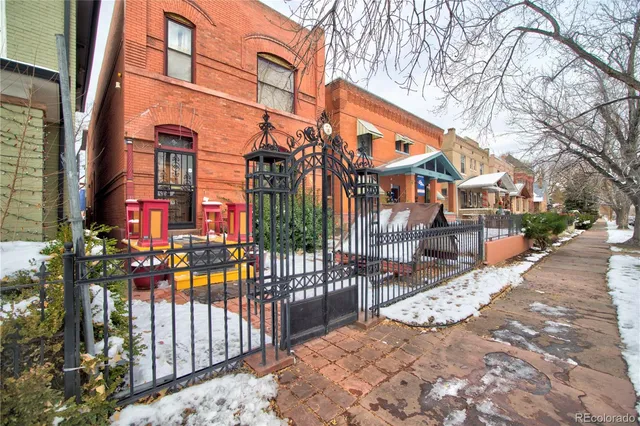 a city street lined with tall buildings