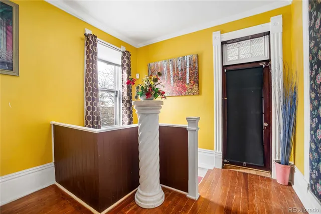 a view of a living room with a large window