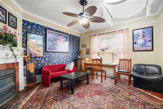 a living room with furniture and a fireplace