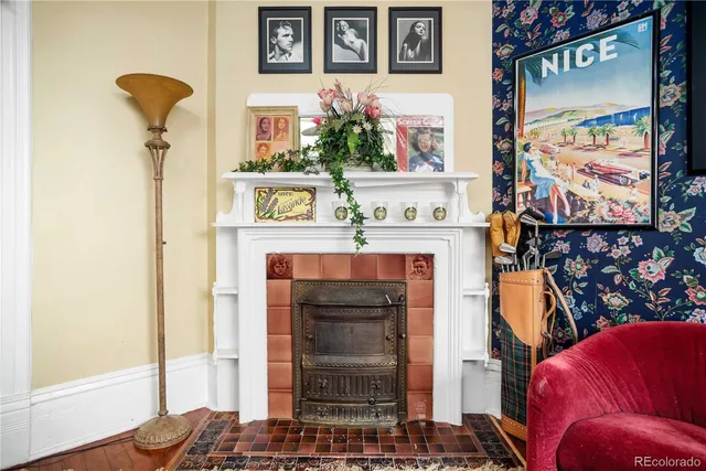 a living room with furniture and a rug