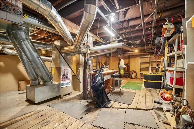 a gym room with lots of gym equipment